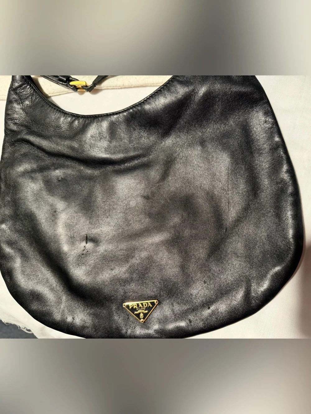 Prada Black Leather Hobo with Gold Chain Accent and dust bag .